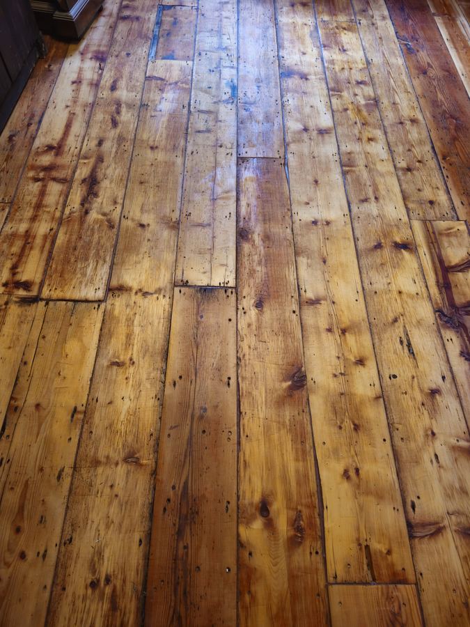 Wide pine boards cleaned back and finished